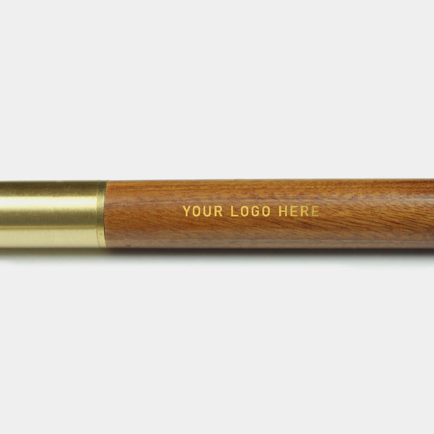 Wooden luxury rollerball pen with brass detail with black and blue inc. Engraved with your company logo